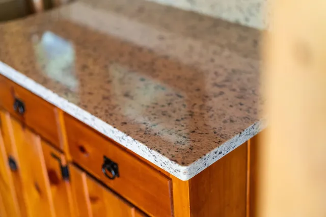 a view of wooden floor and a window