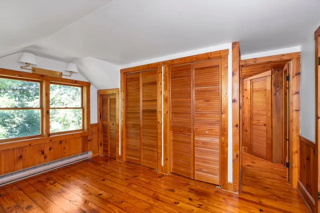 a view of an empty room with stairs