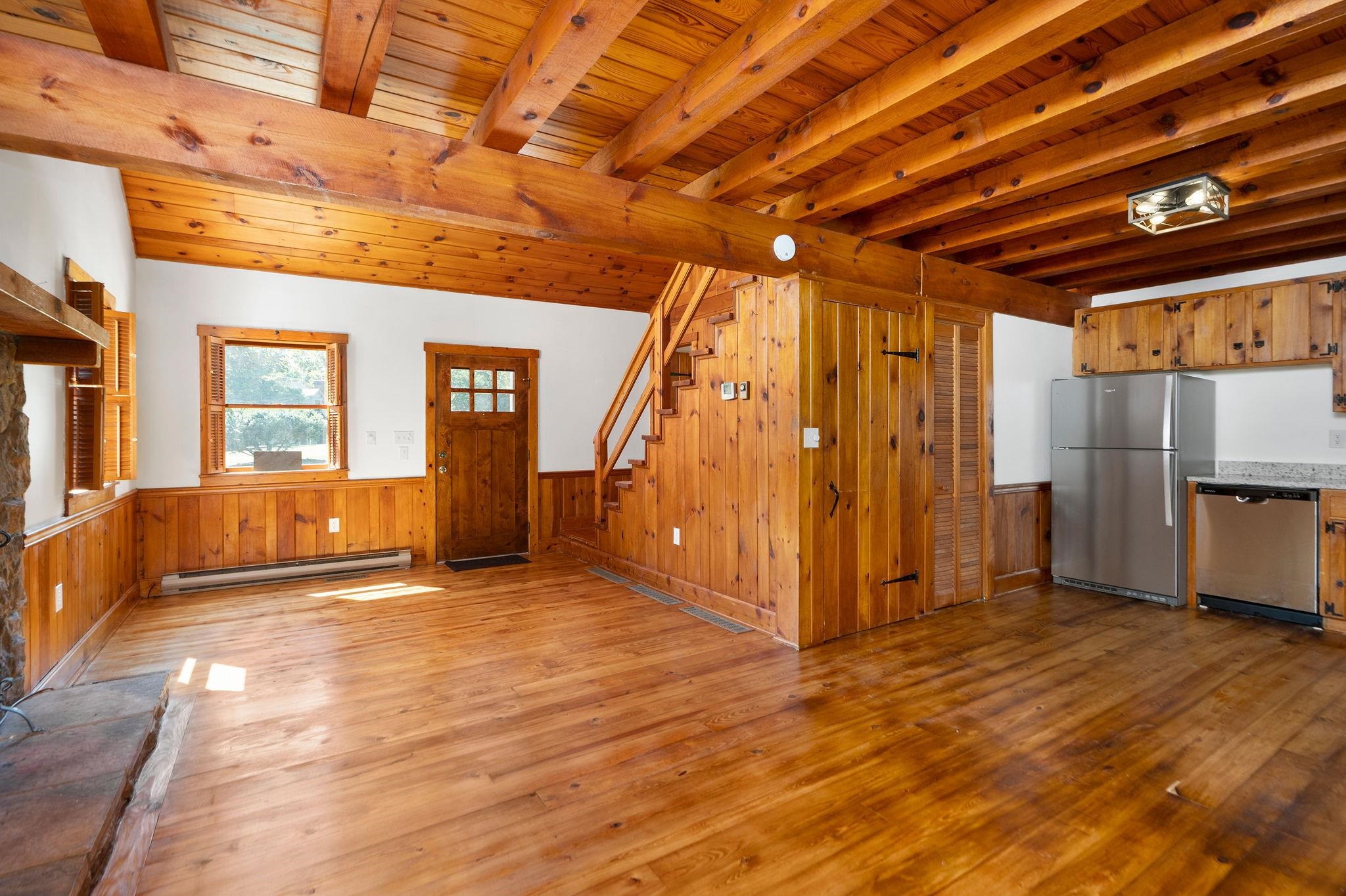188 River Rdg Road Verona, VA 24482 - Photo 51 of 64 a view of empty room with wooden floor and windows