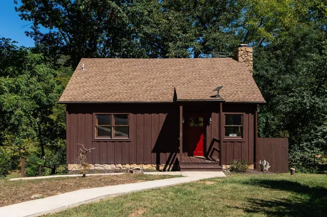 front view of a house with a yard