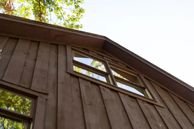 a view of swimming pool with a yard