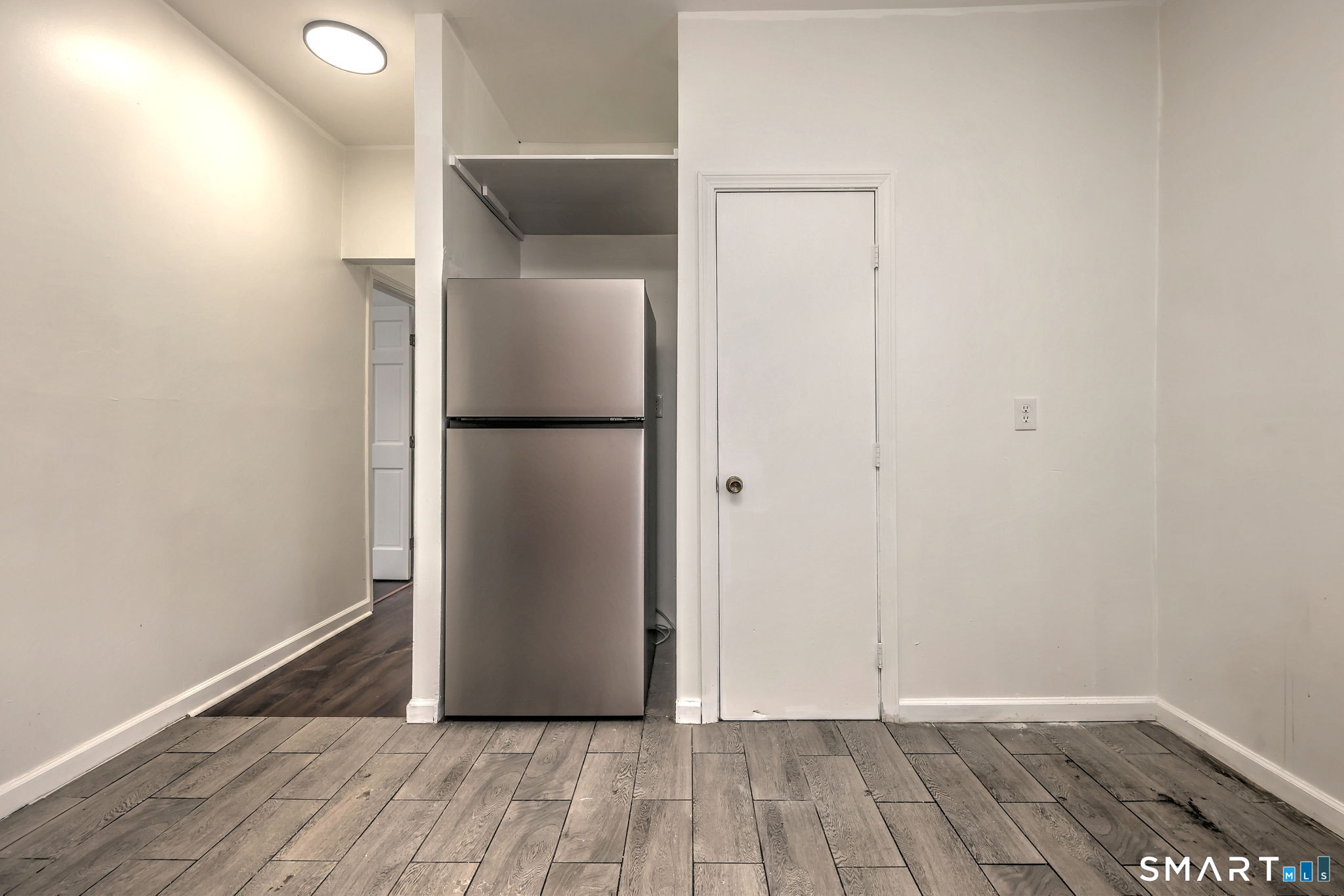 483 Ferry Street, Unit 1 New Haven, CT 06513 - Photo 18 of 33 a view of a room with wooden floor