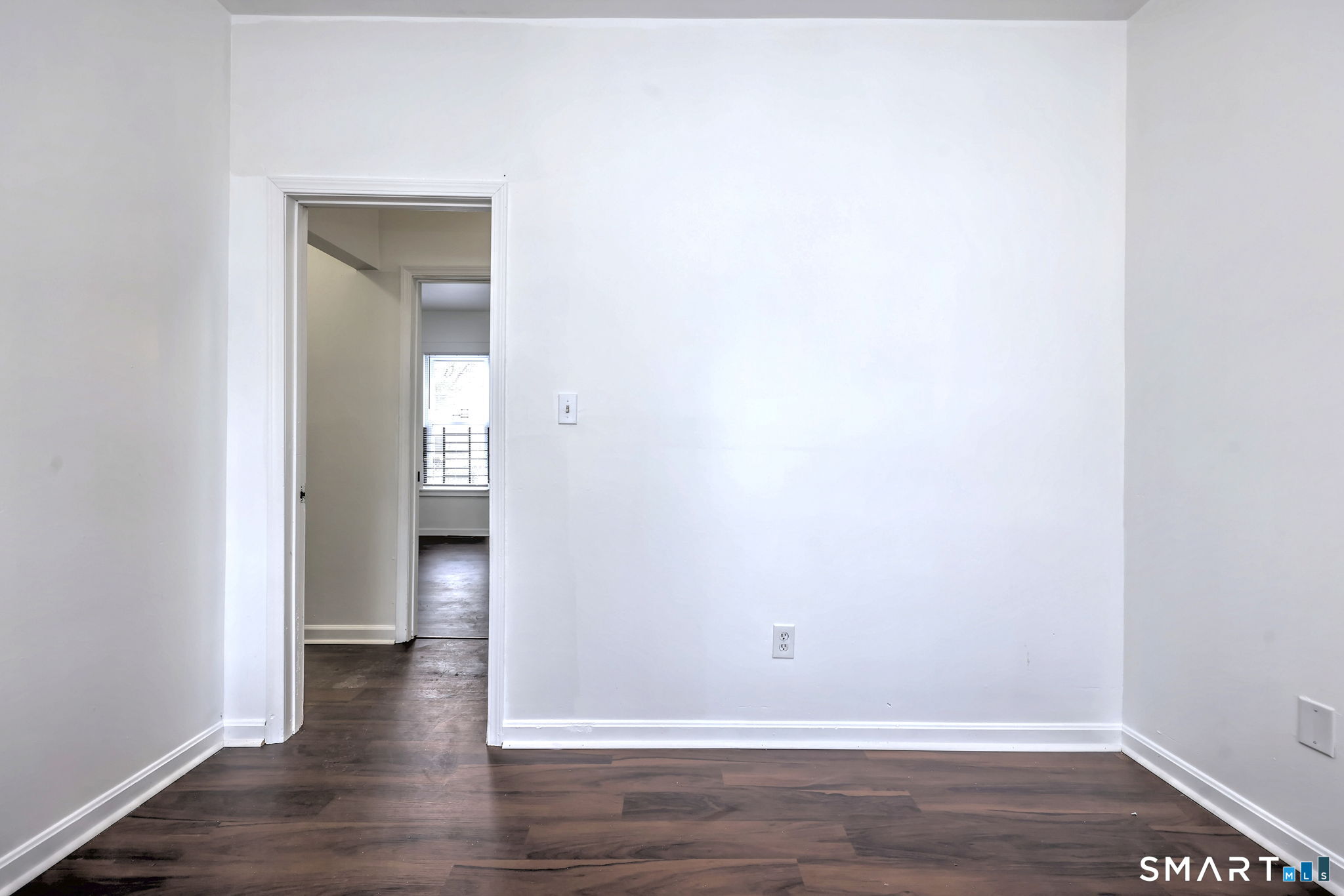 483 Ferry Street, Unit 1 New Haven, CT 06513 - Photo 24 of 33 a view of an empty room with wooden floor and closet