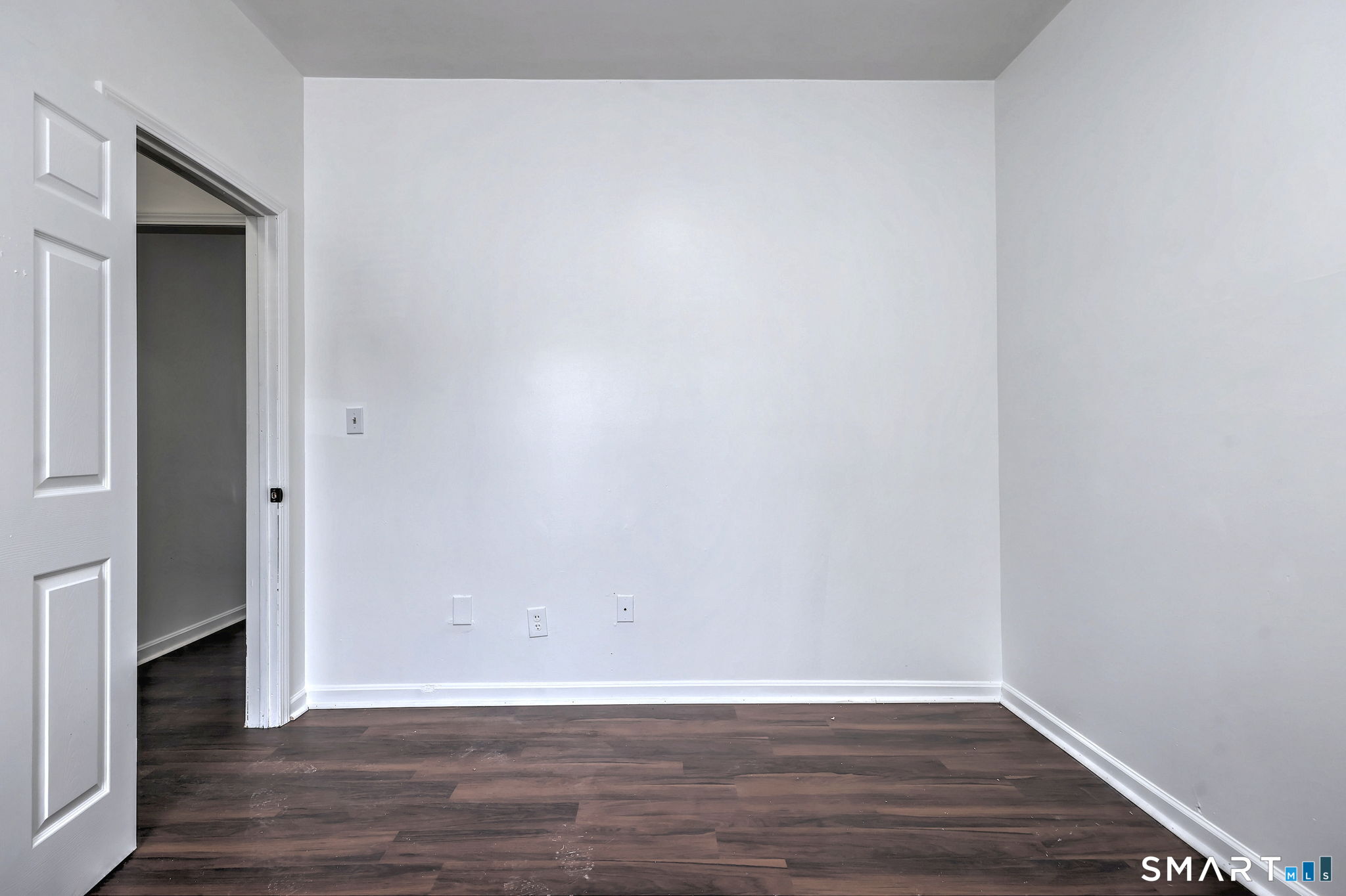 483 Ferry Street, Unit 1 New Haven, CT 06513 - Photo 30 of 33 a view of an empty room with wooden floor and closet