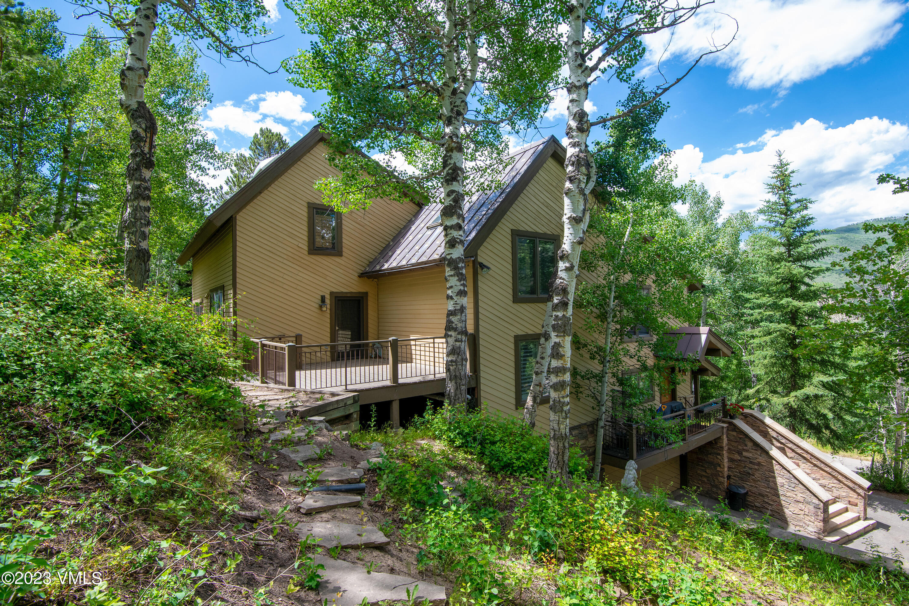 850 Eagle Drive Eagle-Vail, CO 81620 - Photo 3 of 11 a house view with a outdoor space