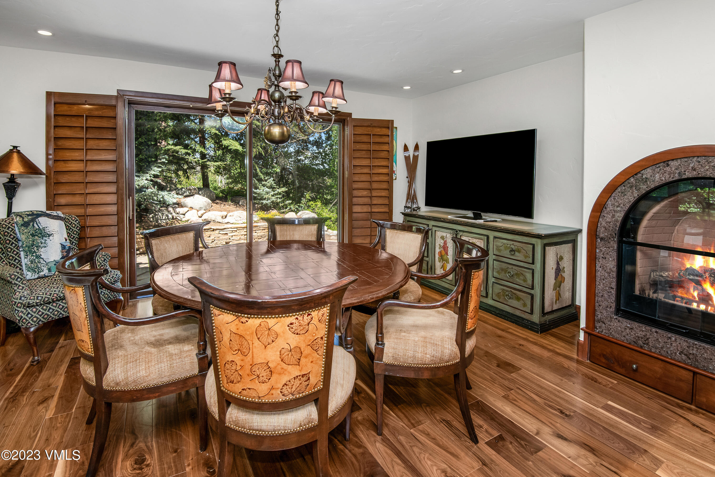 850 Eagle Drive Eagle-Vail, CO 81620 - Photo 5 of 11 a living room with furniture a flat screen tv and a fireplace