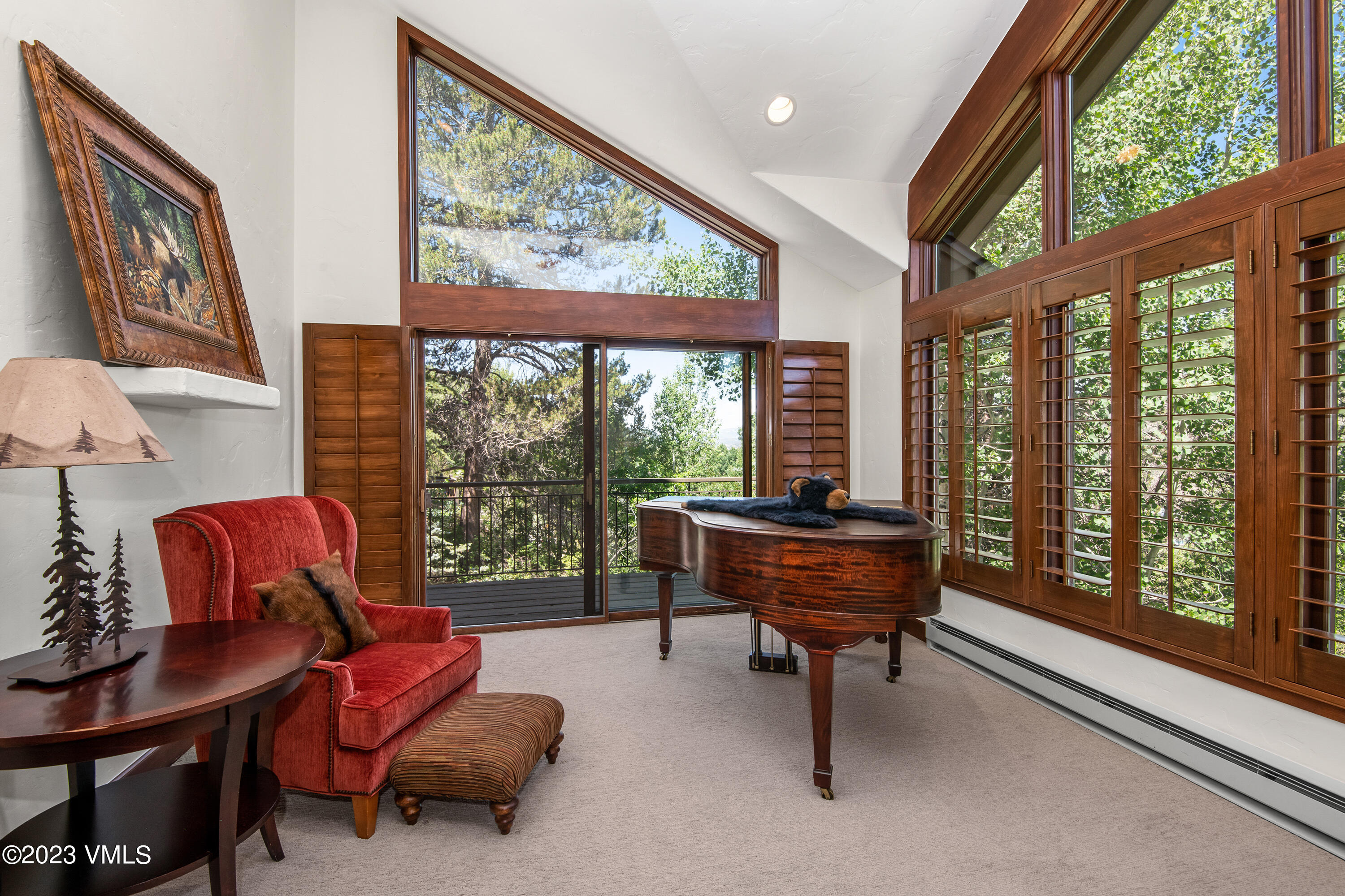 850 Eagle Drive Eagle-Vail, CO 81620 - Photo 6 of 11 a living room with furniture and a large window