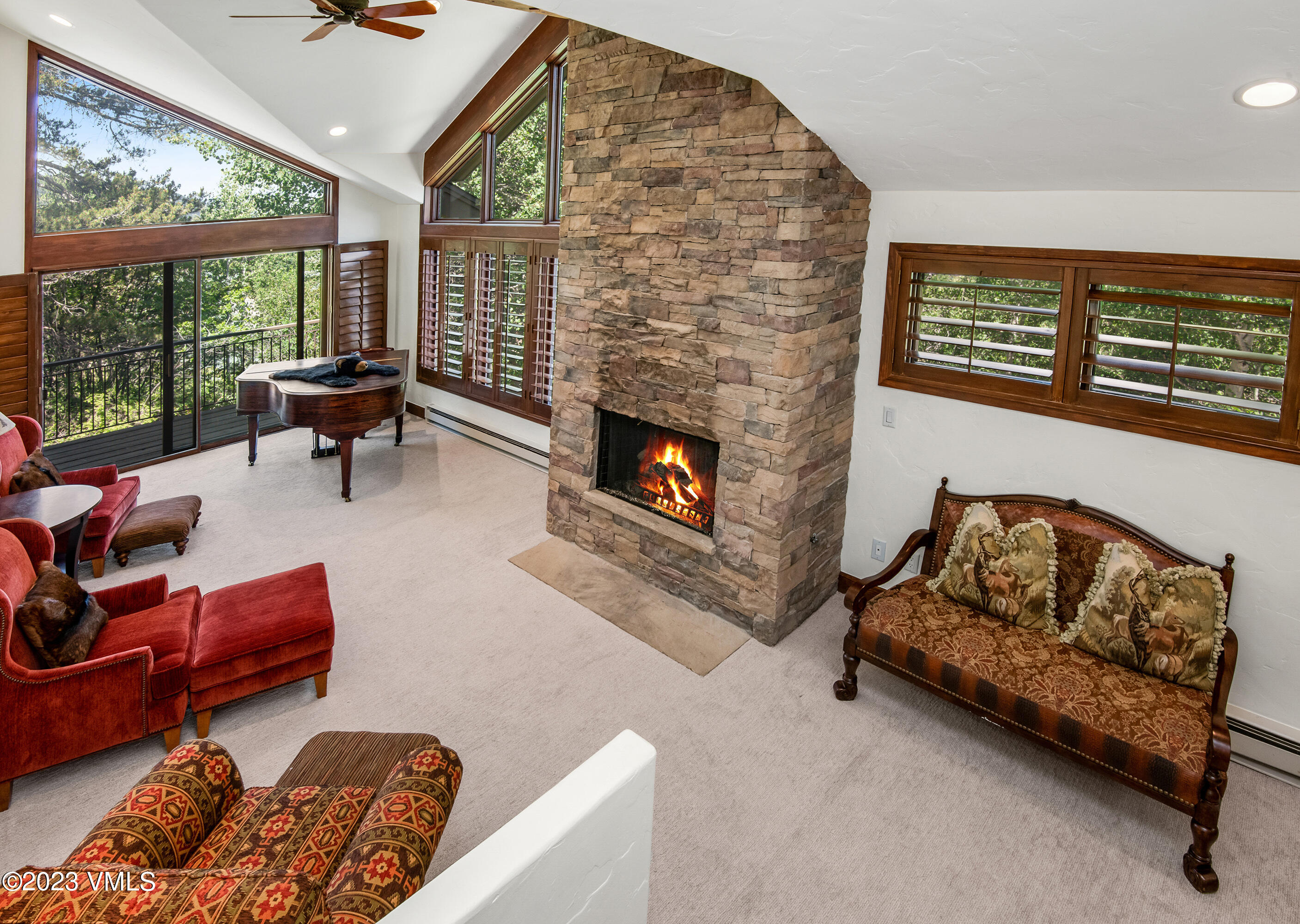 850 Eagle Drive Eagle-Vail, CO 81620 - Photo 7 of 11 a living room with furniture and a fireplace