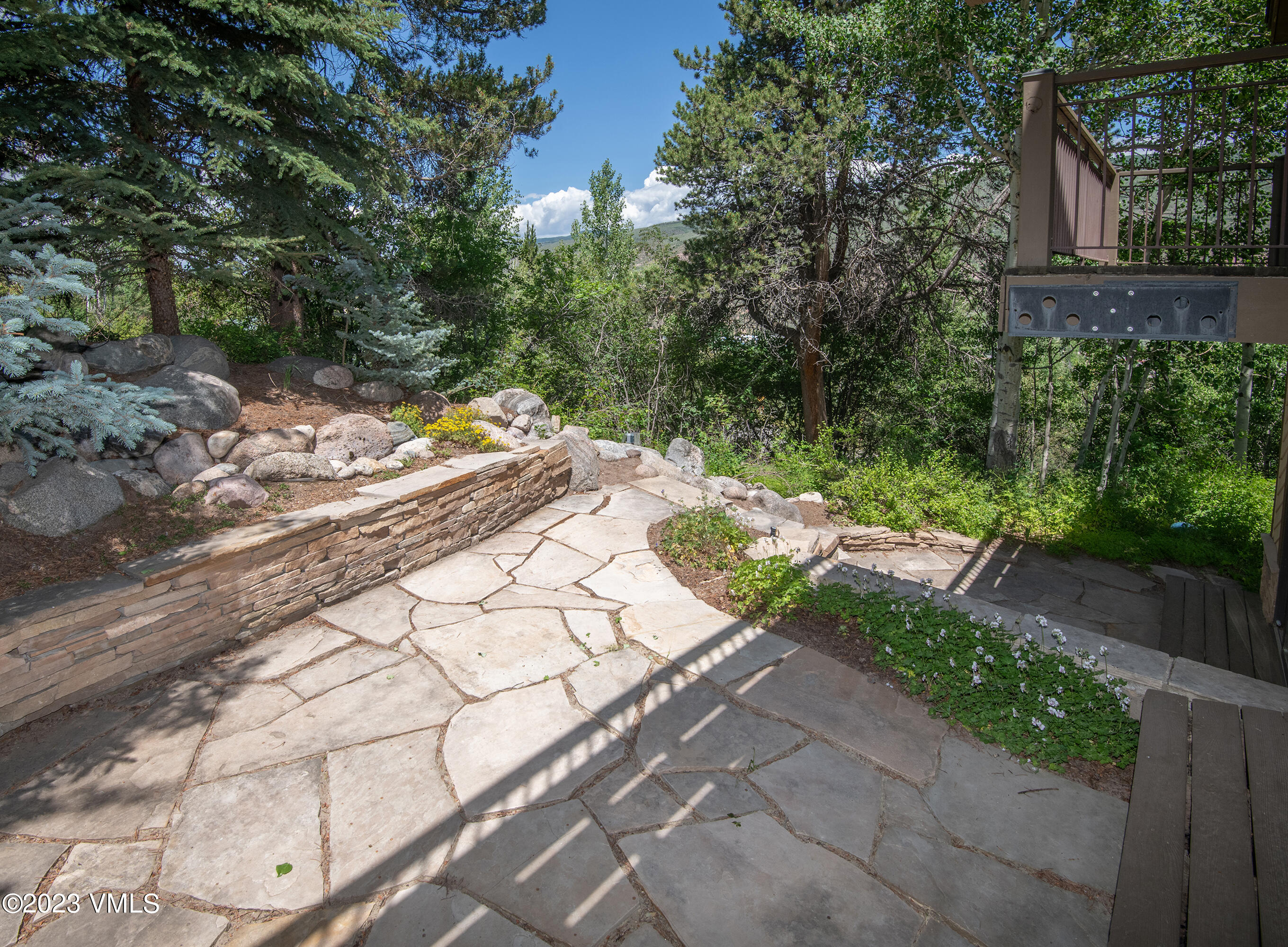 850 Eagle Drive Eagle-Vail, CO 81620 - Photo 10 of 11 a view of a pathway with a yard