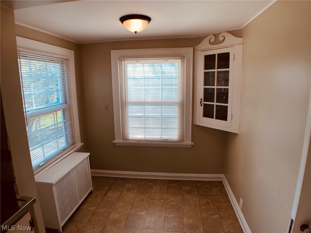 3330 Elsmere Road Cleveland, OH 44120 - Photo 5 of 35 Dinette area of kitchen with built-ins