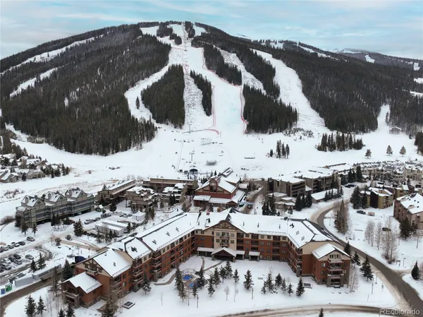 a view of a big building yard and mountain view