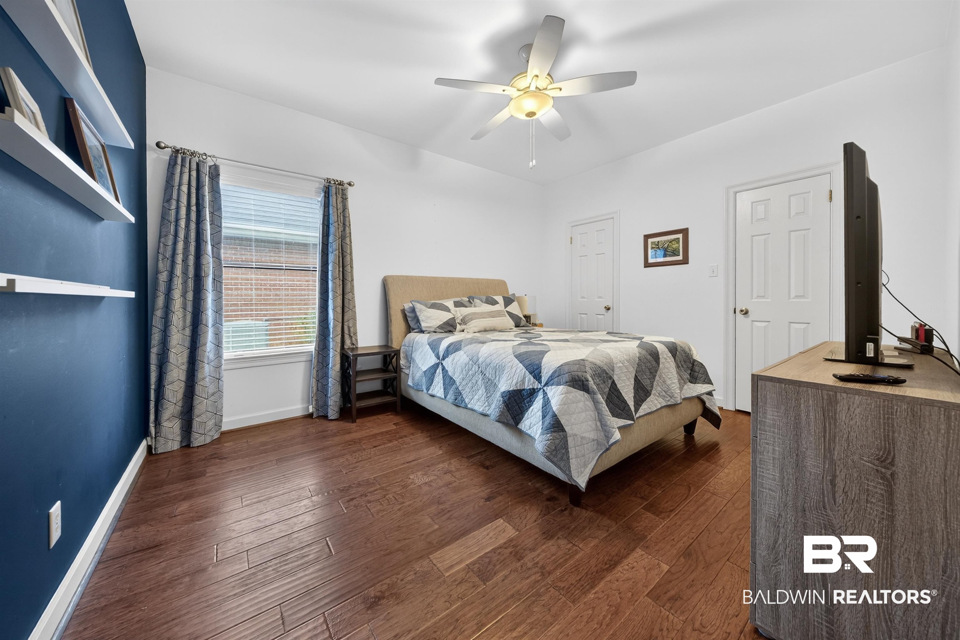 1250 Savannah Drive Mobile, AL 36609 - Photo 24 of 35 Bedroom with dark wood-style flooring and a ceiling fan