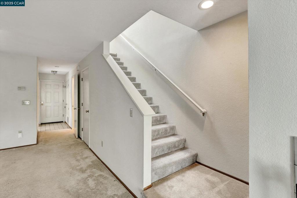 1300 Walden Road Walnut Creek, CA 94597 - Photo 15 of 52 a view of a hallway with staircase