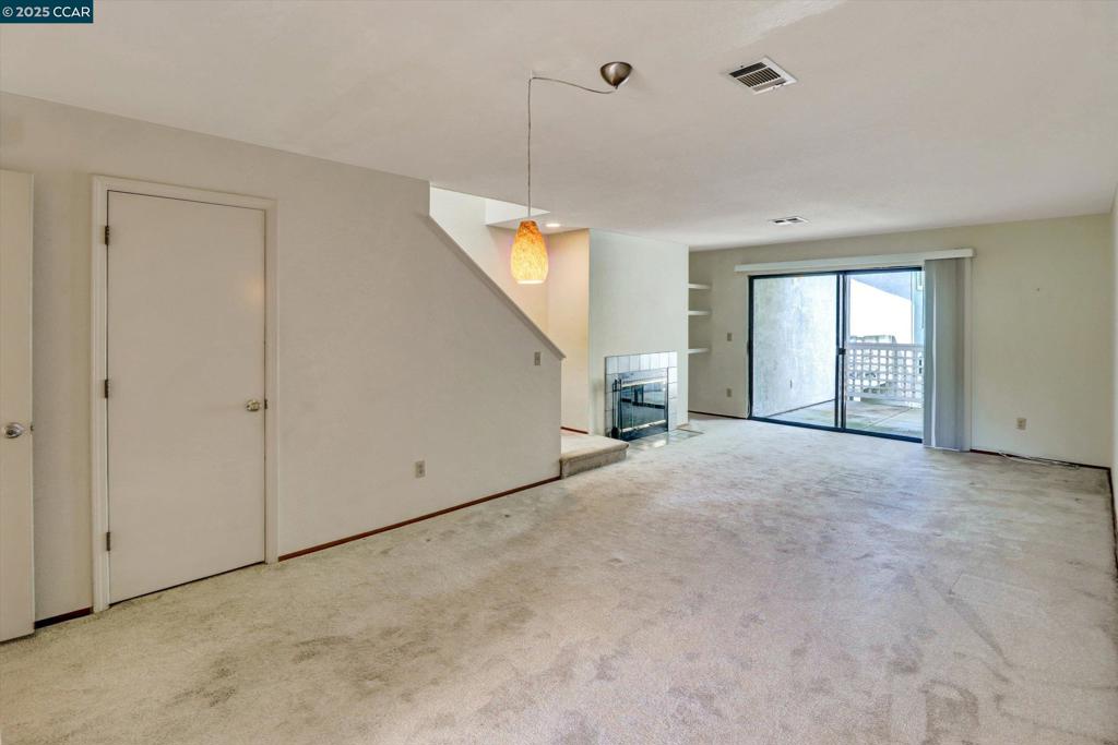1300 Walden Road Walnut Creek, CA 94597 - Photo 16 of 52 a view of a livingroom with an empty space and a window