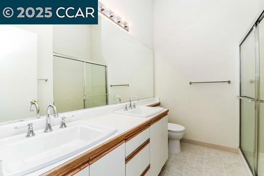 1300 Walden Road Walnut Creek, CA 94597 - Photo 20 of 52 a bathroom with a sink and a mirror