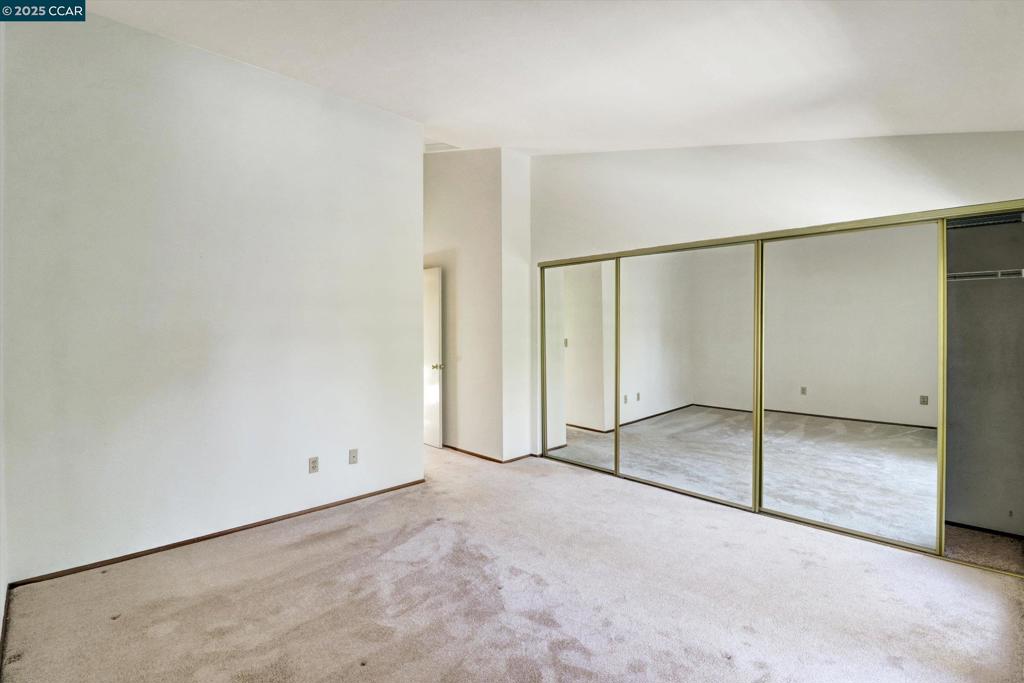 1300 Walden Road Walnut Creek, CA 94597 - Photo 27 of 52 an empty room with sliding glass door