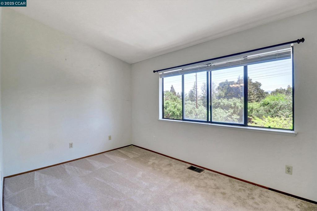1300 Walden Road Walnut Creek, CA 94597 - Photo 34 of 52 an empty room with a window
