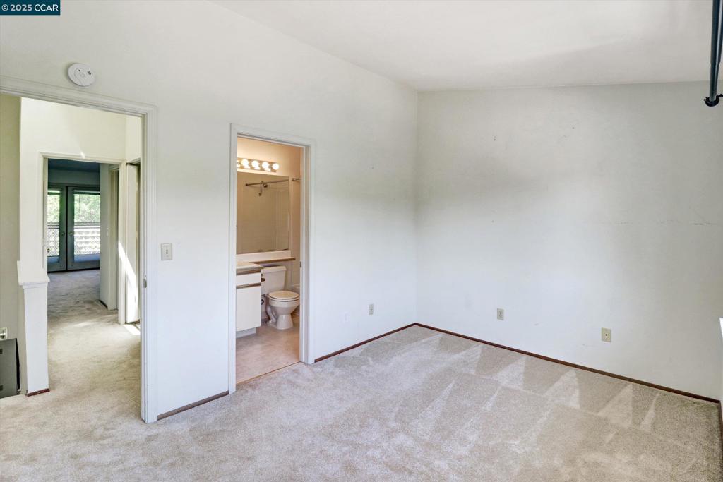 1300 Walden Road Walnut Creek, CA 94597 - Photo 36 of 52 an empty room with closet and windows