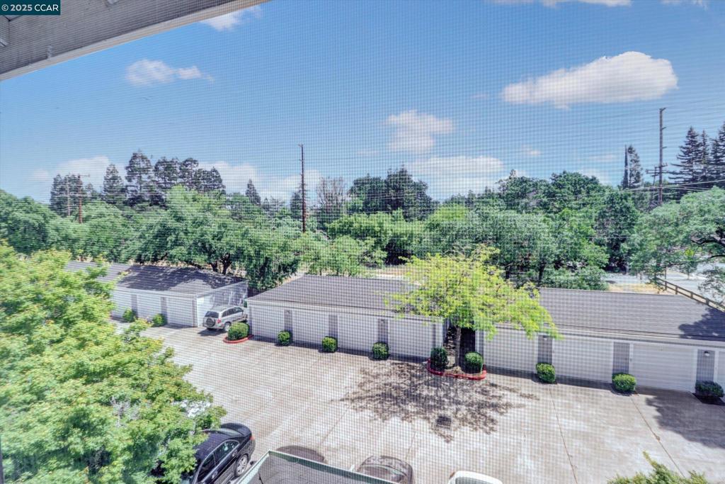 1300 Walden Road Walnut Creek, CA 94597 - Photo 45 of 52 a view of a house with a yard and a sitting area