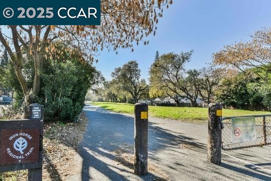 1300 Walden Road Walnut Creek, CA 94597 - Photo 50 of 52 a street sign on a sidewalk next to a road