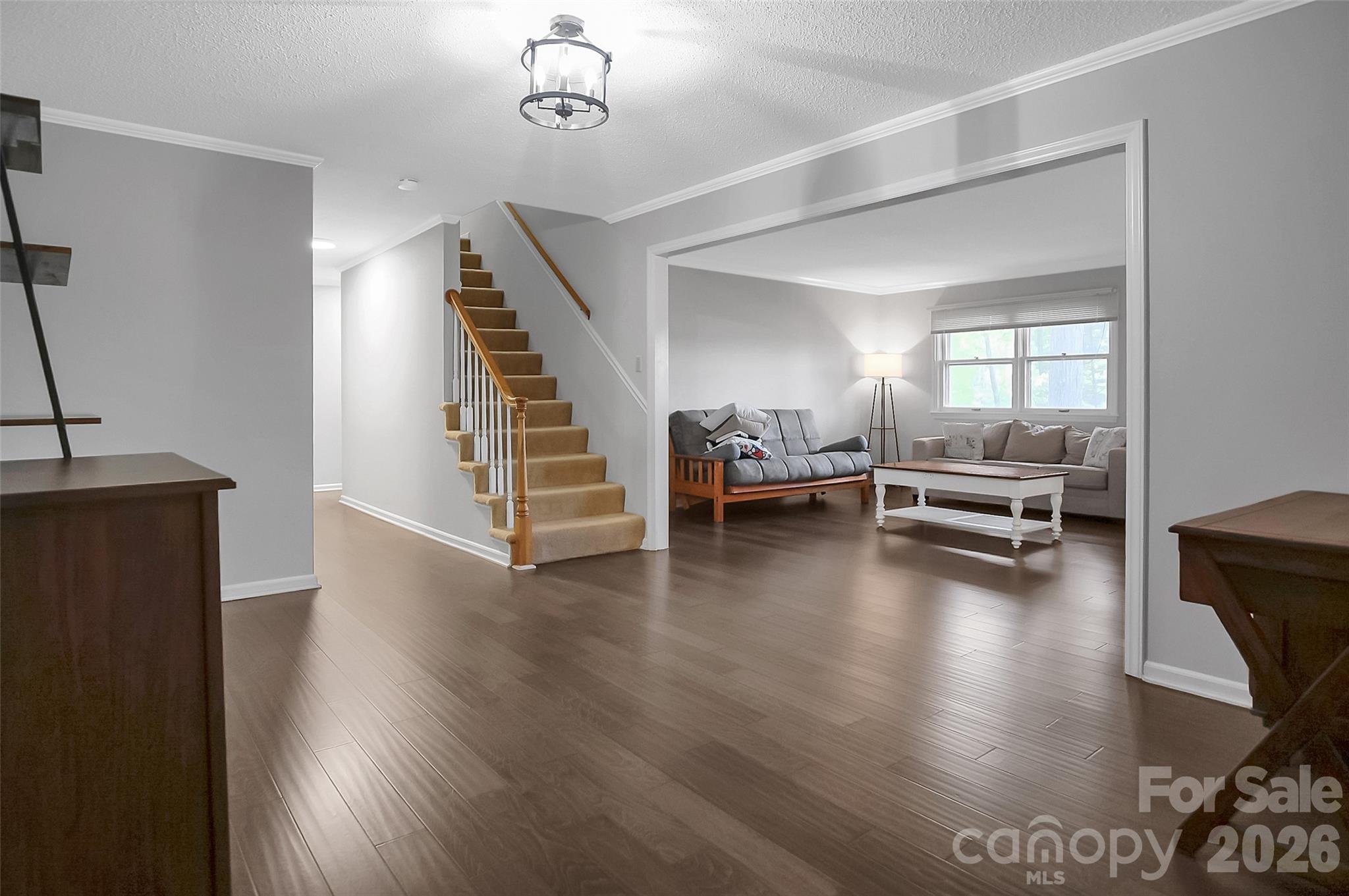808 Old Mt Holly Road Stanley, NC 28164 - Photo 20 of 48 a view of a livingroom with wooden floor and furniture