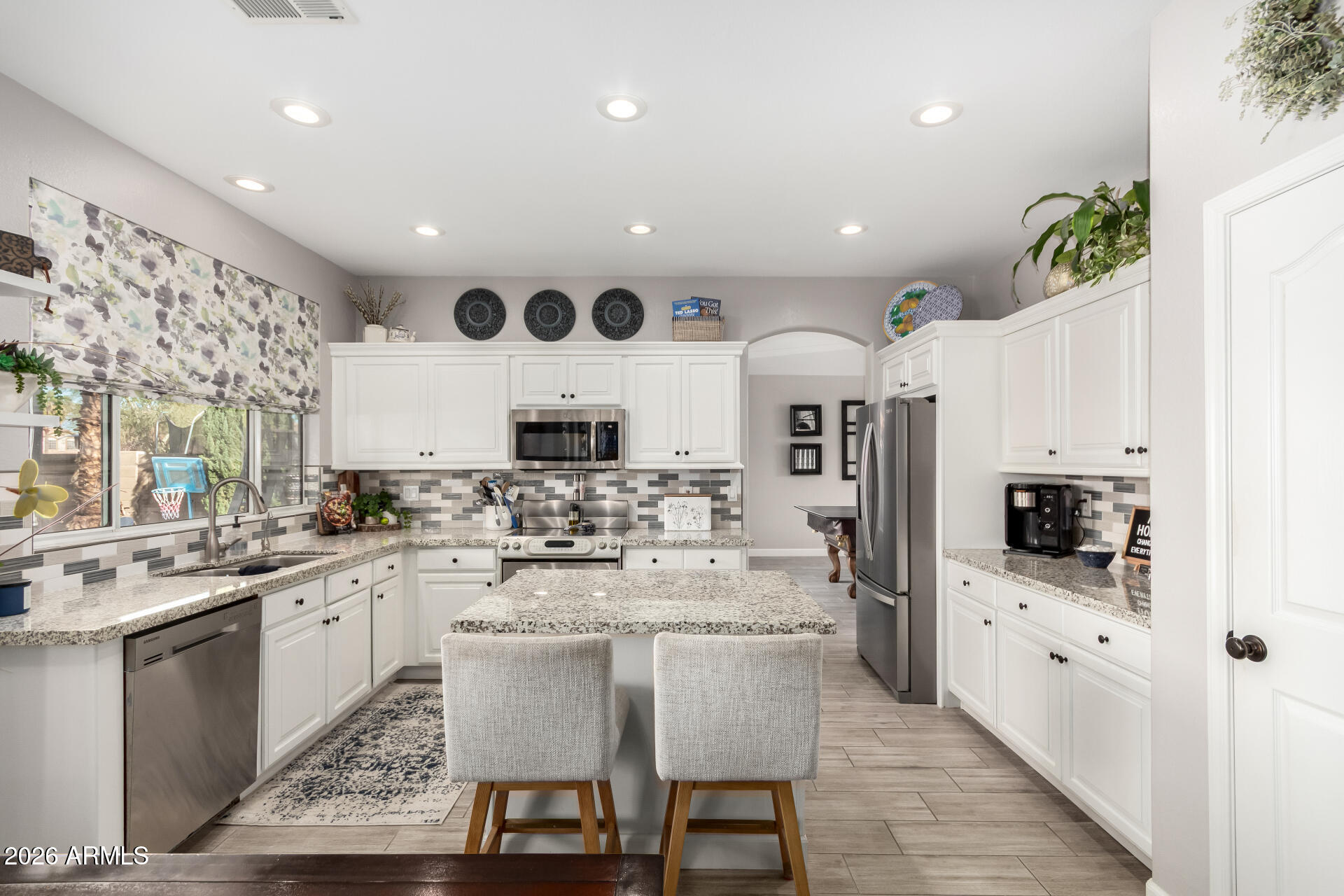 240 East Gail Court Gilbert, AZ 85296 - Photo 12 of 49 a large kitchen with cabinets