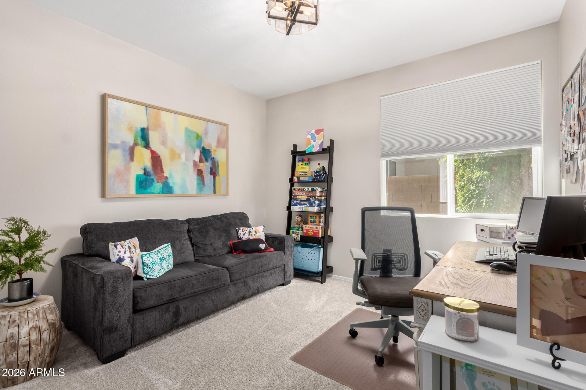 240 East Gail Court Gilbert, AZ 85296 - Photo 16 of 49 a living room with furniture and a flat screen tv