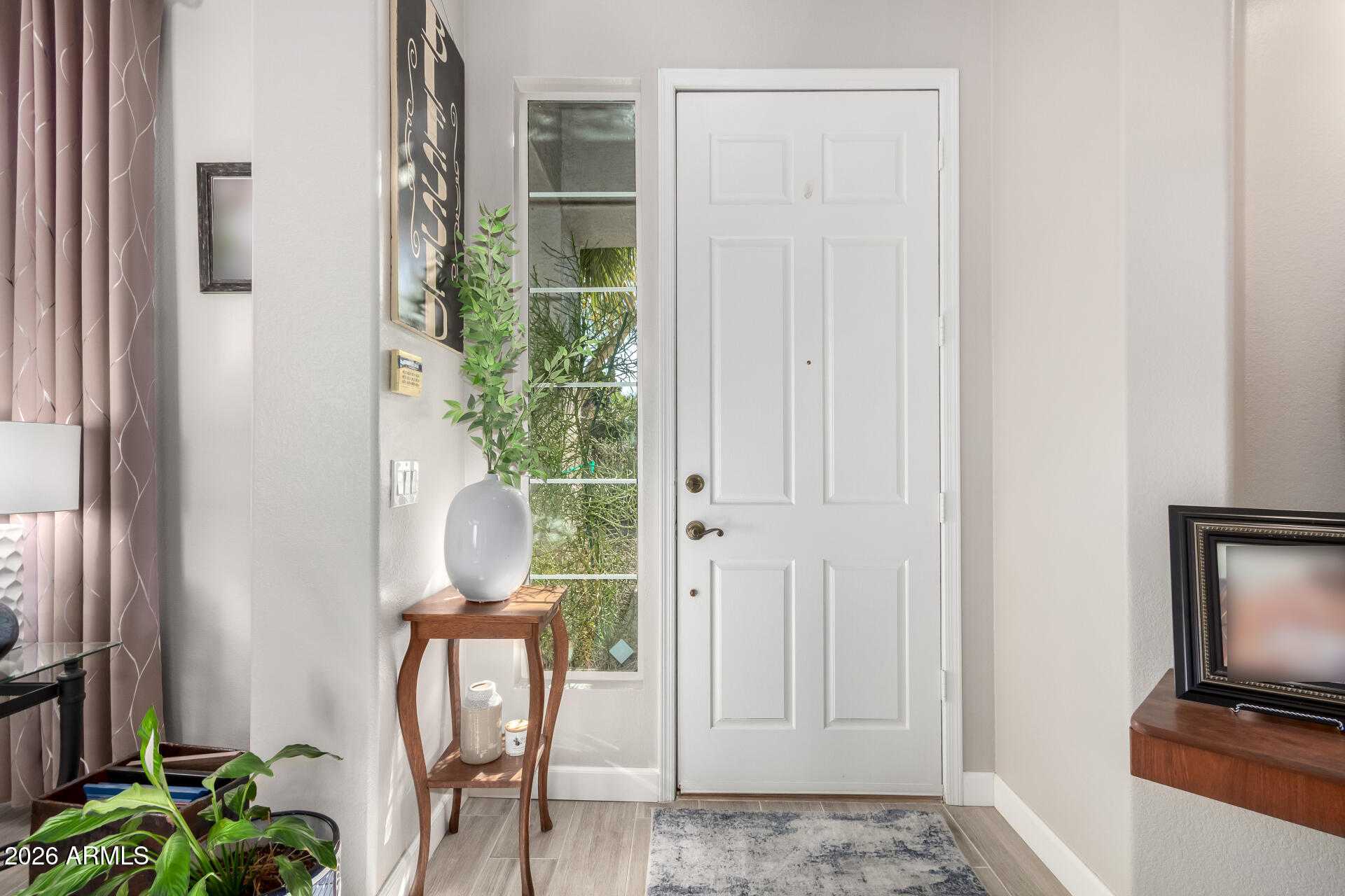 240 East Gail Court Gilbert, AZ 85296 - Photo 2 of 49 a view of a livingroom with furniture and a window