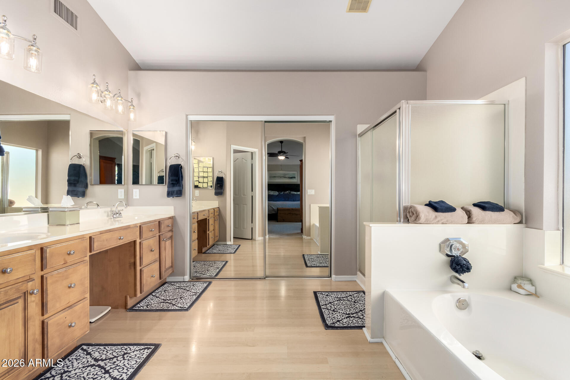 240 East Gail Court Gilbert, AZ 85296 - Photo 25 of 49 a large bathroom with a tub sink and mirror