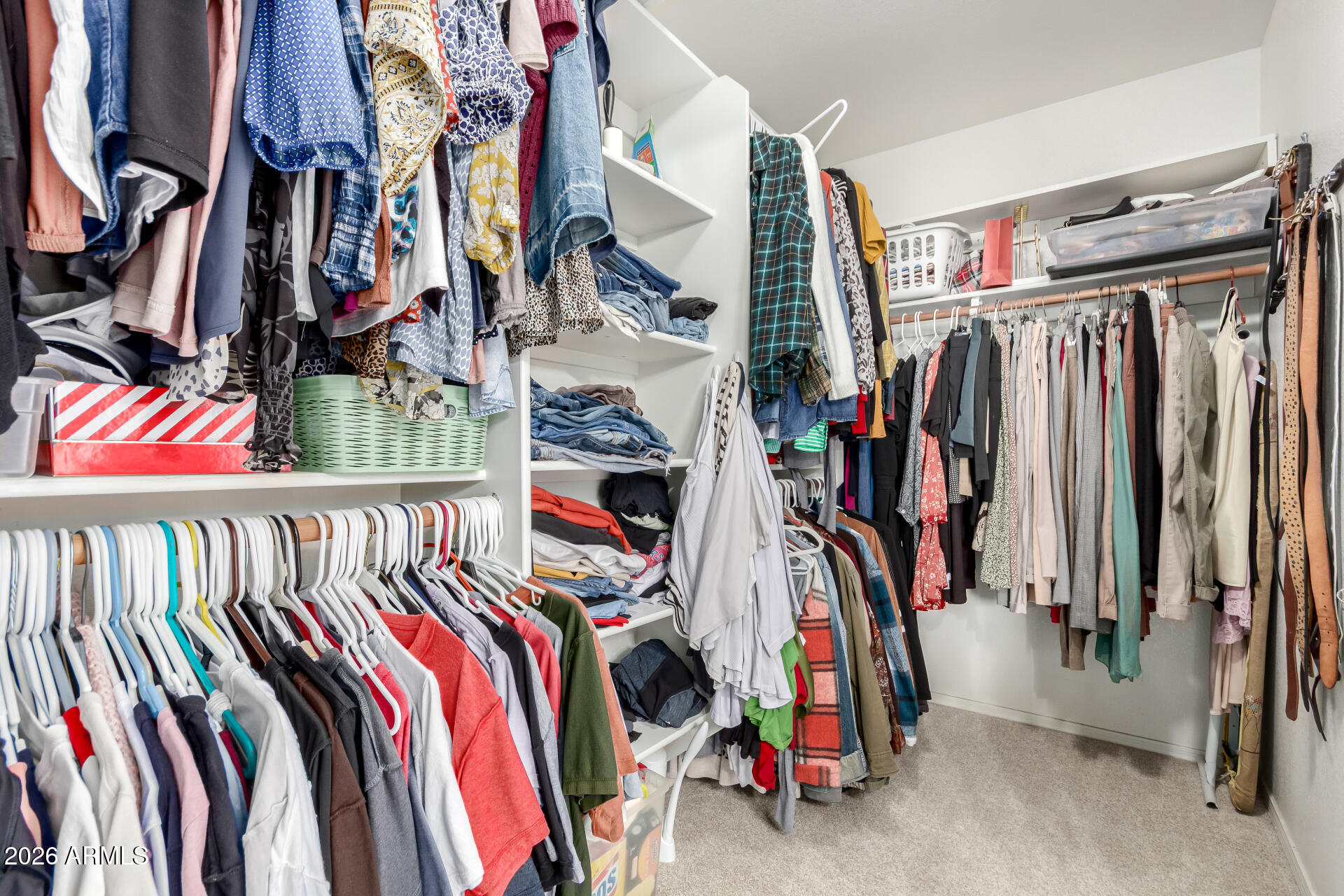 240 East Gail Court Gilbert, AZ 85296 - Photo 28 of 49 a view of walk in closet with clothes