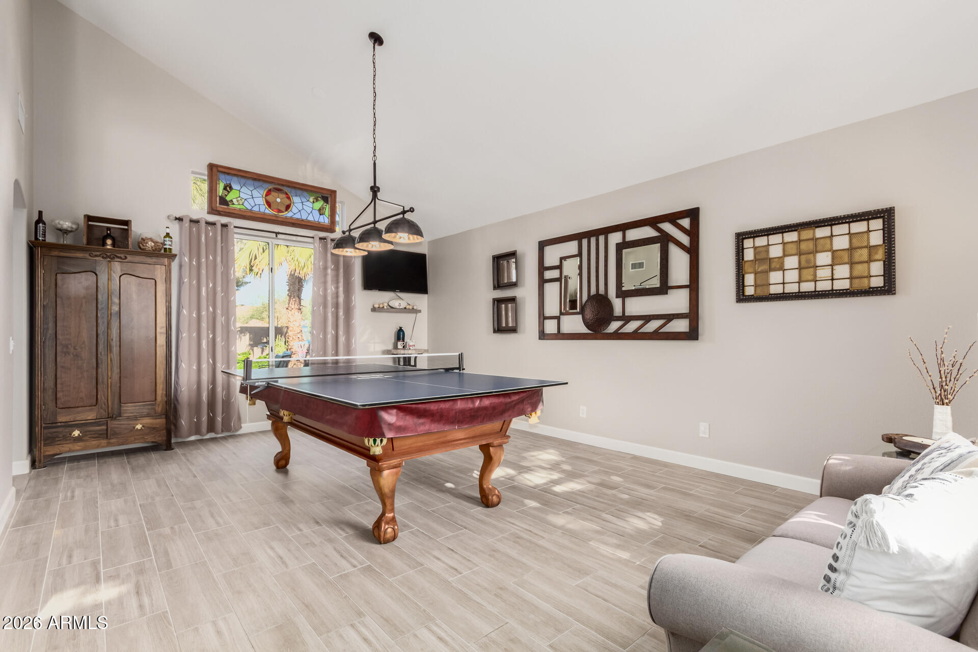 240 East Gail Court Gilbert, AZ 85296 - Photo 3 of 49 a living room with furniture a rug and a window