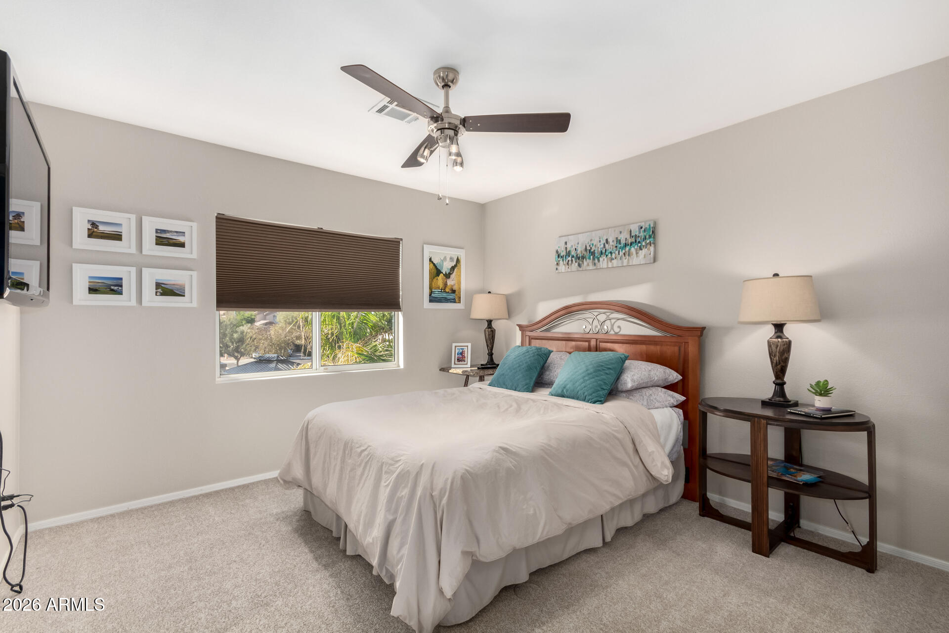 240 East Gail Court Gilbert, AZ 85296 - Photo 32 of 49 a bedroom with a bed and a flat screen tv