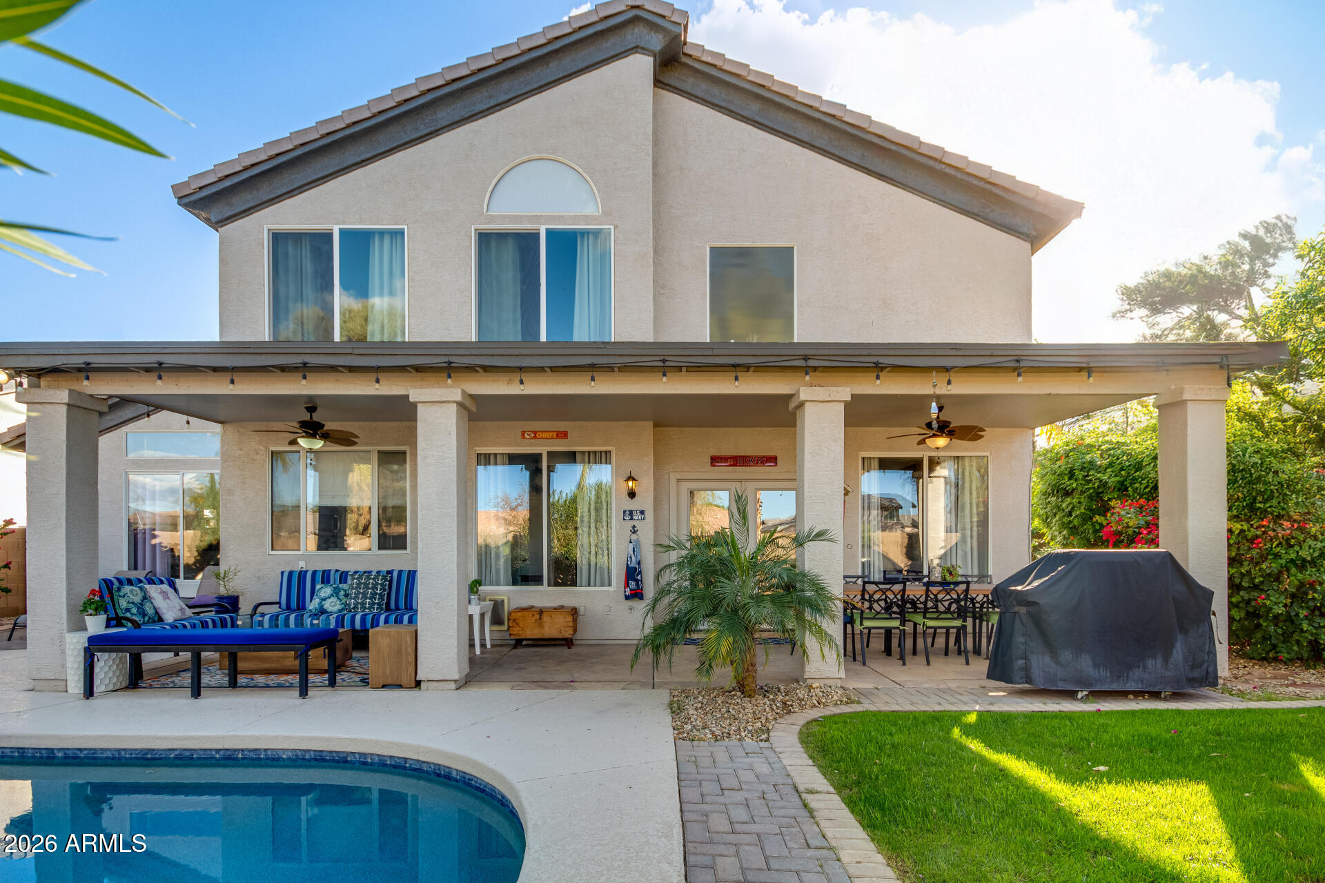 240 East Gail Court Gilbert, AZ 85296 - Photo 45 of 49 a view of a house with backyard porch and sitting area