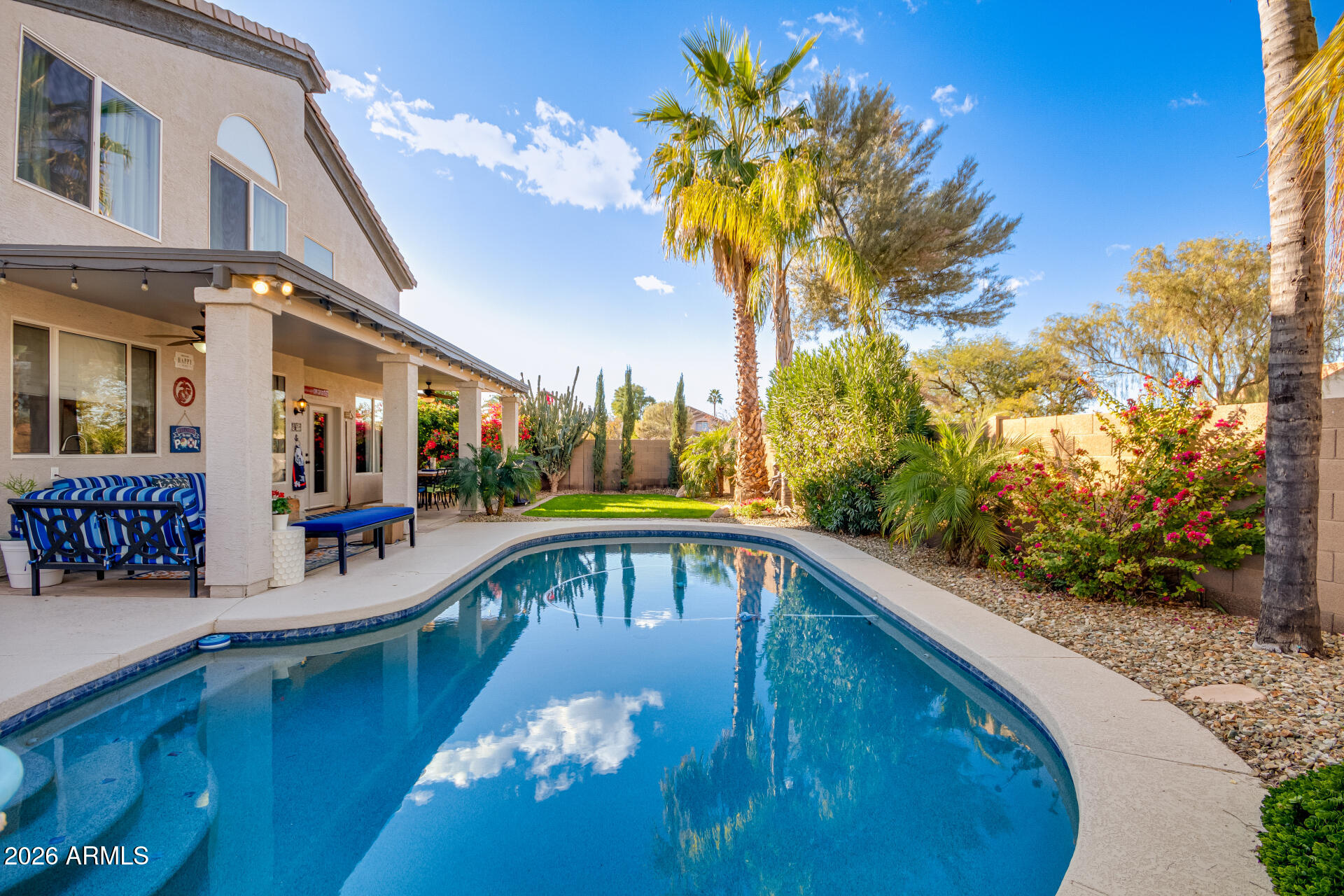 240 East Gail Court Gilbert, AZ 85296 - Photo 46 of 49 a view of a swimming pool with a patio