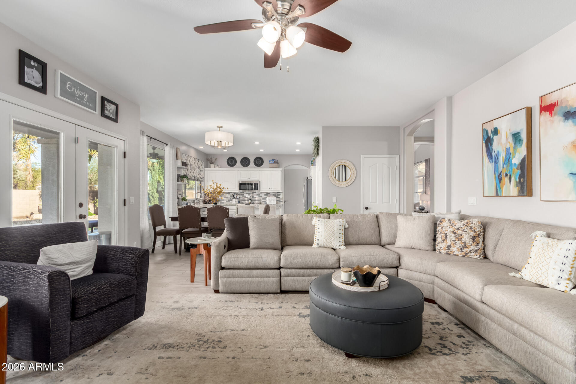 240 East Gail Court Gilbert, AZ 85296 - Photo 9 of 49 a living room with furniture and a large window