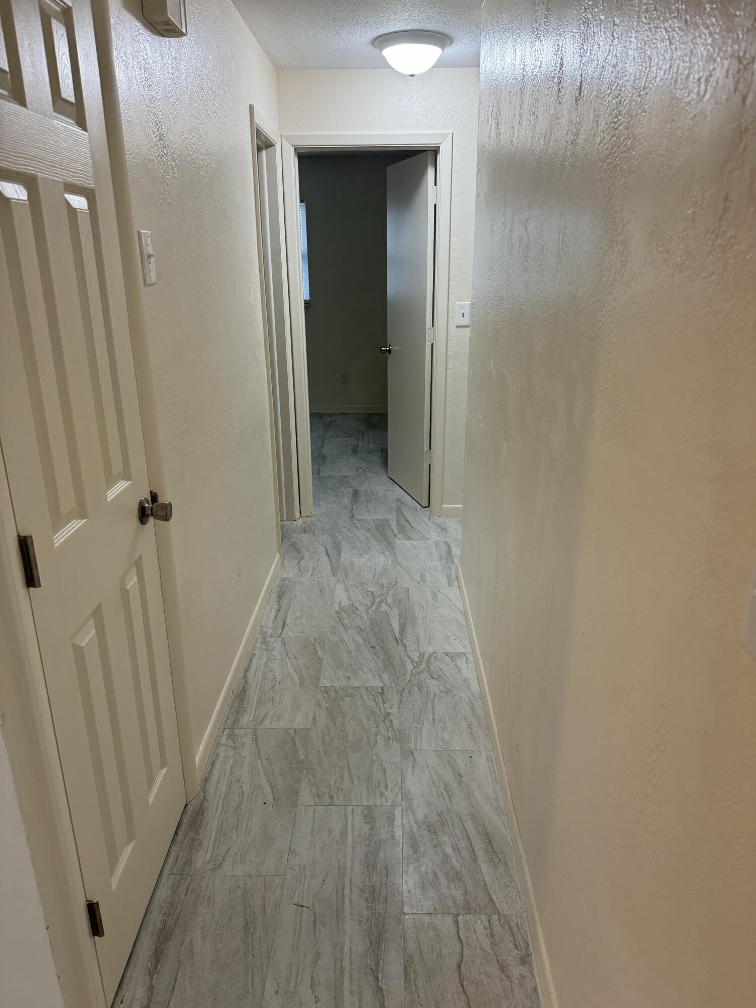 970 Butia Street Merritt Island, FL 32953 - Photo 19 of 28 Hallway to bedrooms