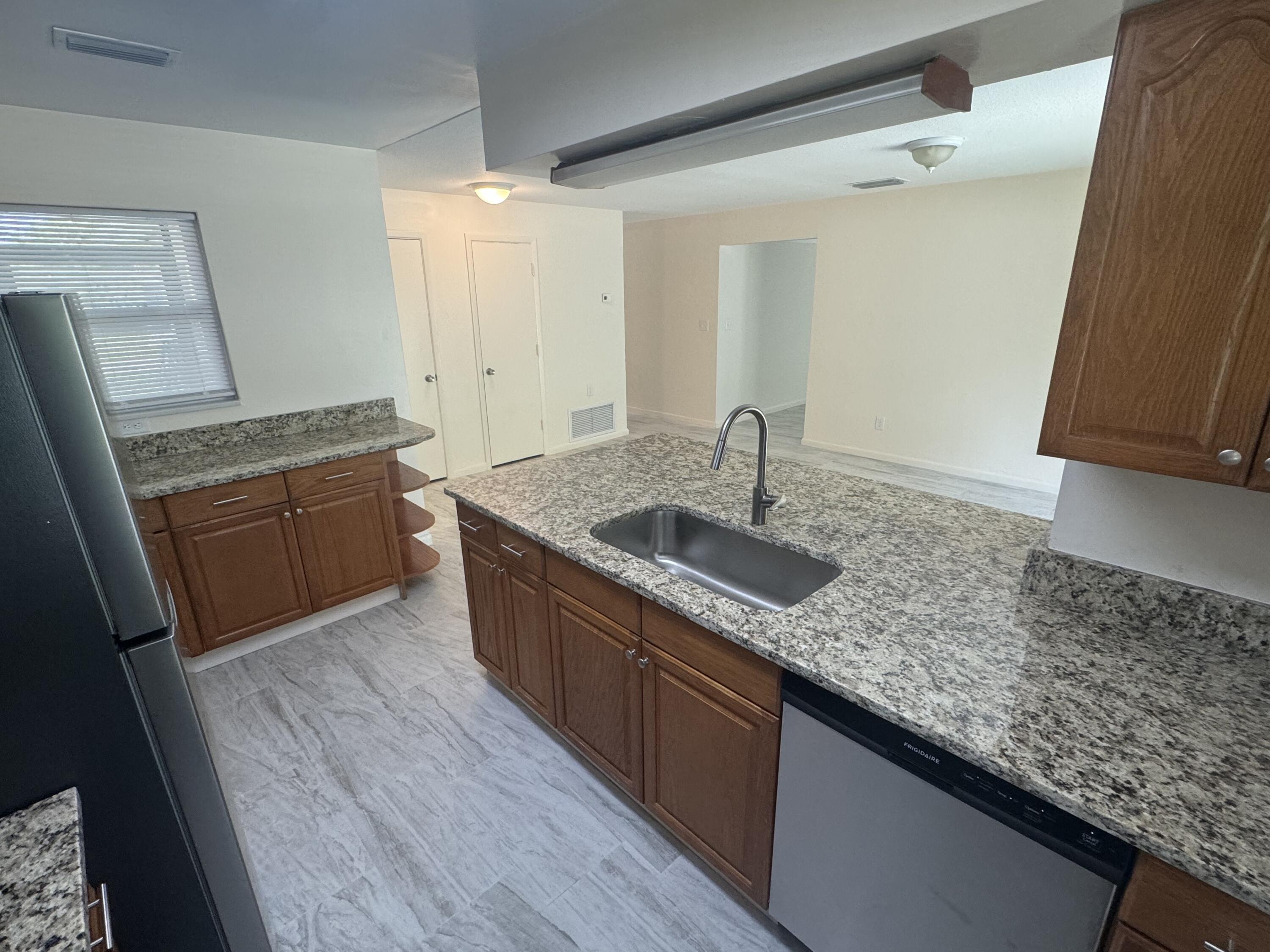 970 Butia Street Merritt Island, FL 32953 - Photo 20 of 28 Kitchen has extra storage