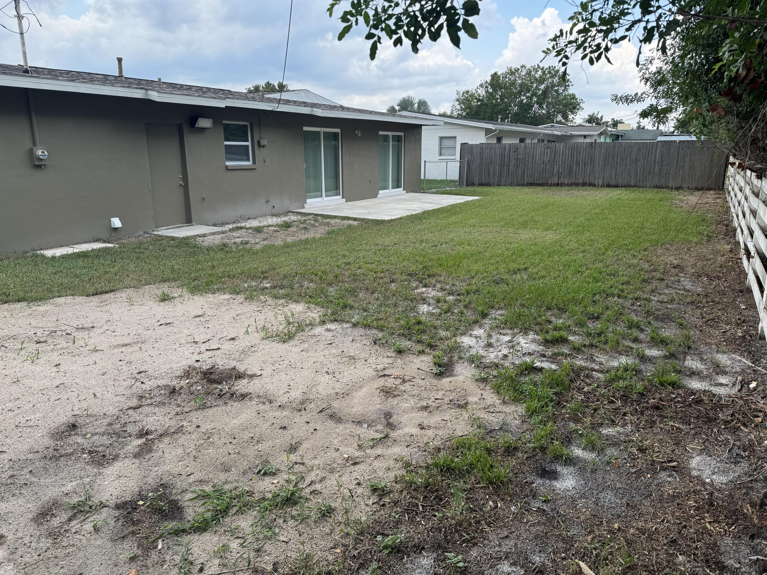 970 Butia Street Merritt Island, FL 32953 - Photo 25 of 28 Backyard has patio