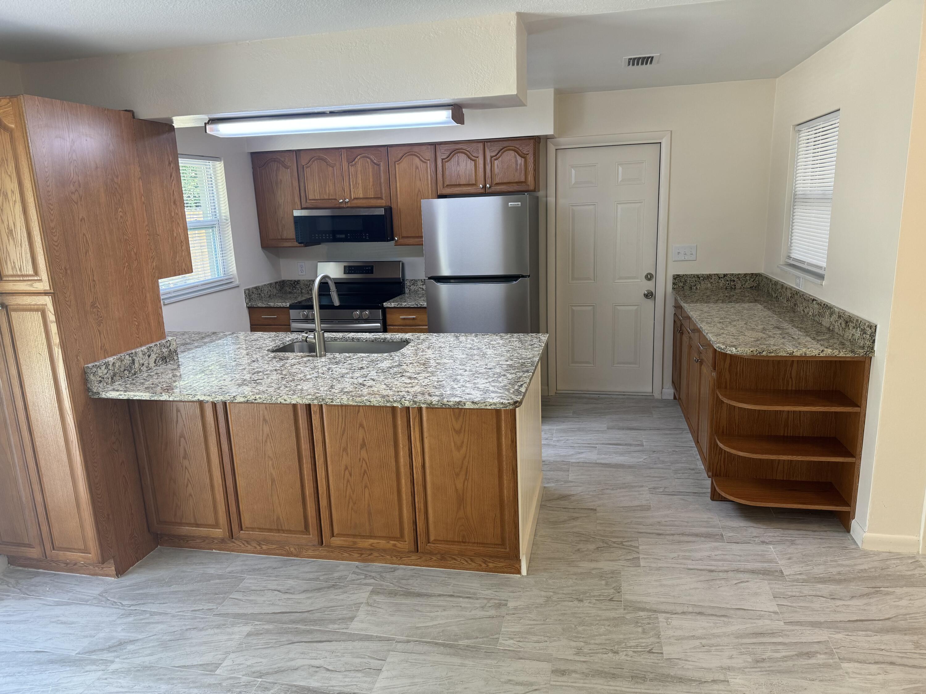 970 Butia Street Merritt Island, FL 32953 - Photo 3 of 28 Breakfast Bar has storage