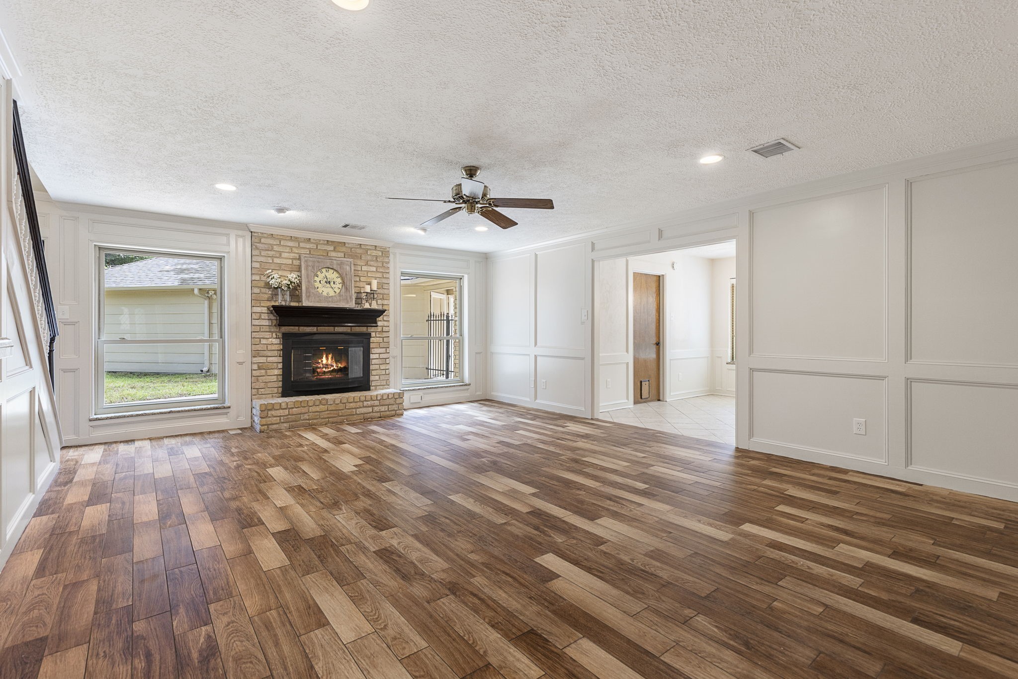 17706 Asphodel Lane Spring, TX 77379 - Photo 18 of 48 Large living room with custom wood paneling