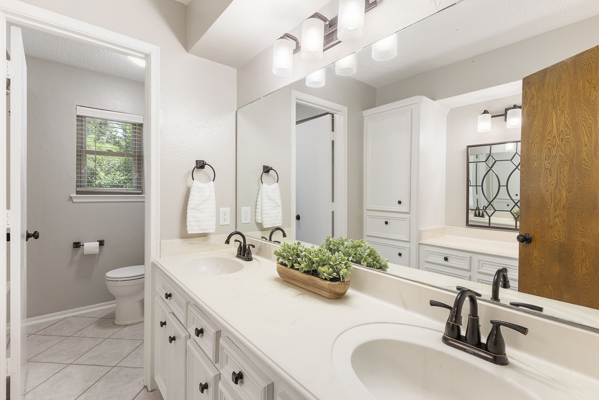17706 Asphodel Lane Spring, TX 77379 - Photo 39 of 48 a bathroom with a sink double vanity and a mirror