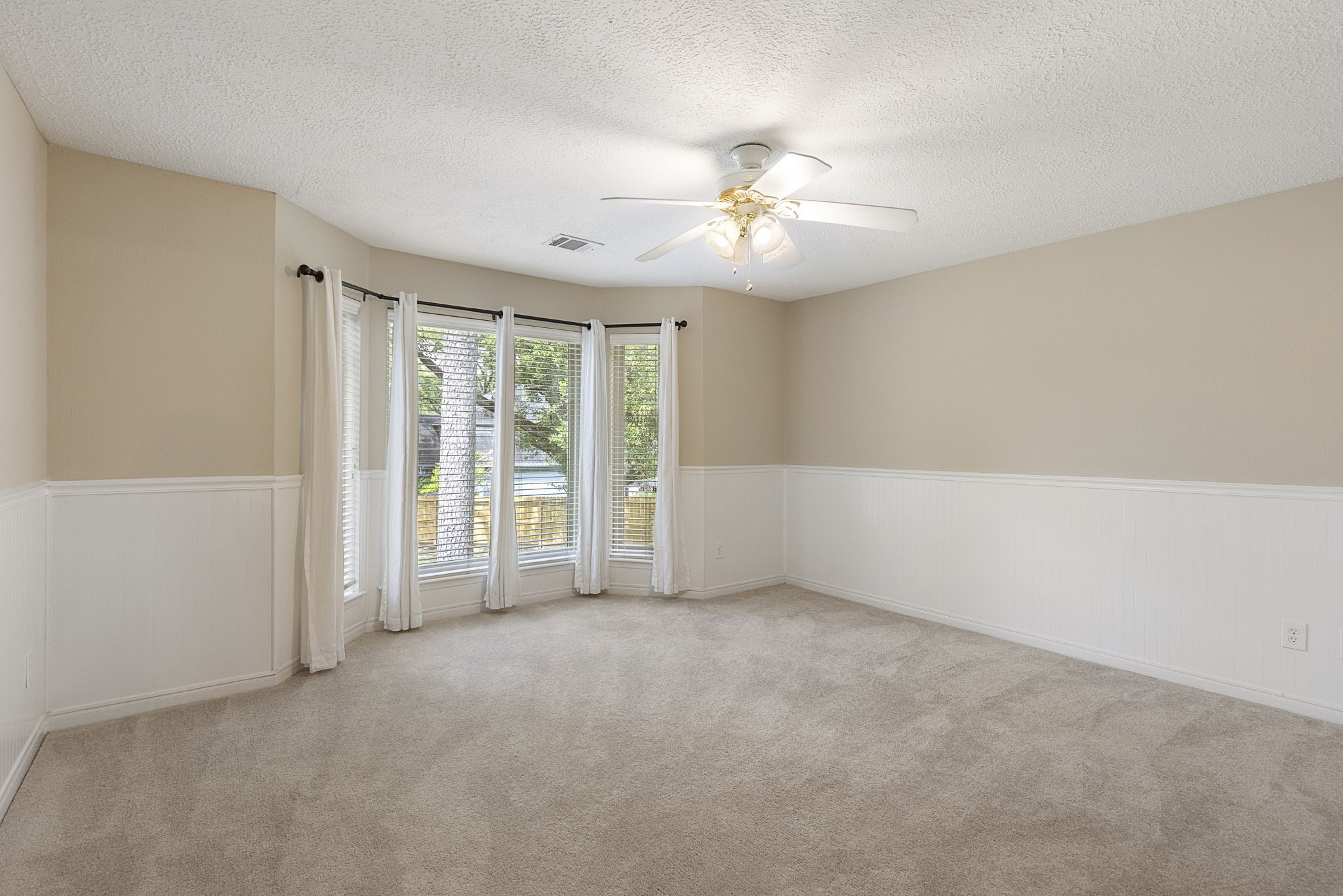 17706 Asphodel Lane Spring, TX 77379 - Photo 40 of 48 an empty room with chandelier fan