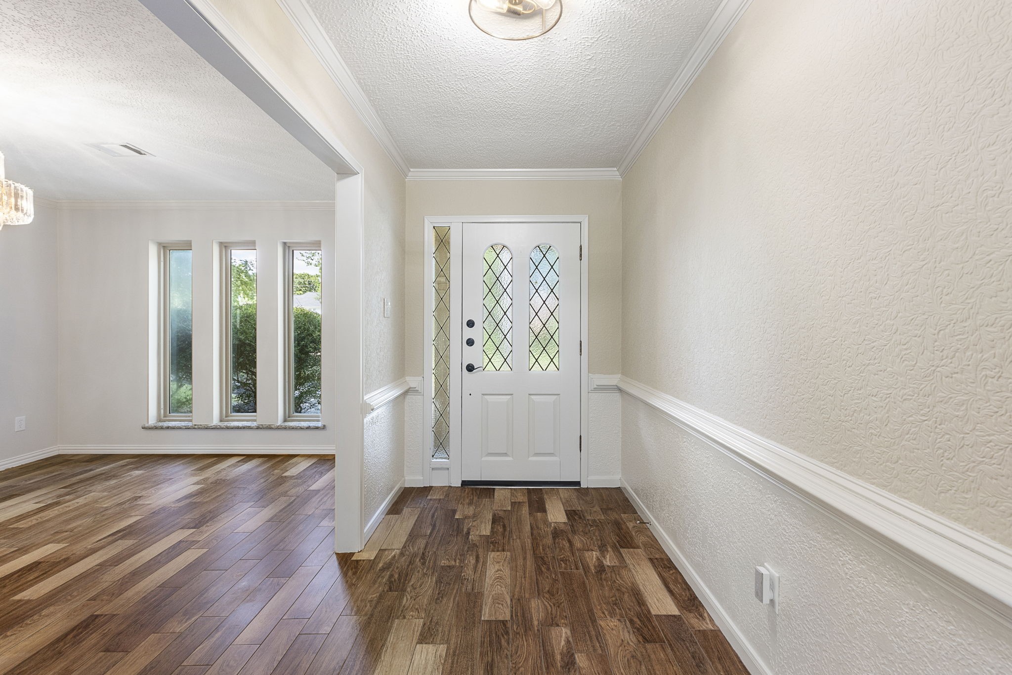 17706 Asphodel Lane Spring, TX 77379 - Photo 4 of 48 View of the front door and formal dining room from the living room