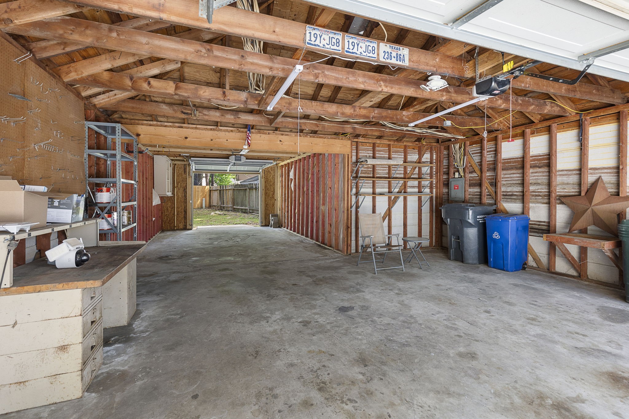 17706 Asphodel Lane Spring, TX 77379 - Photo 41 of 48 Extra large 3 car garage with additional garage door to the rear of the yard.