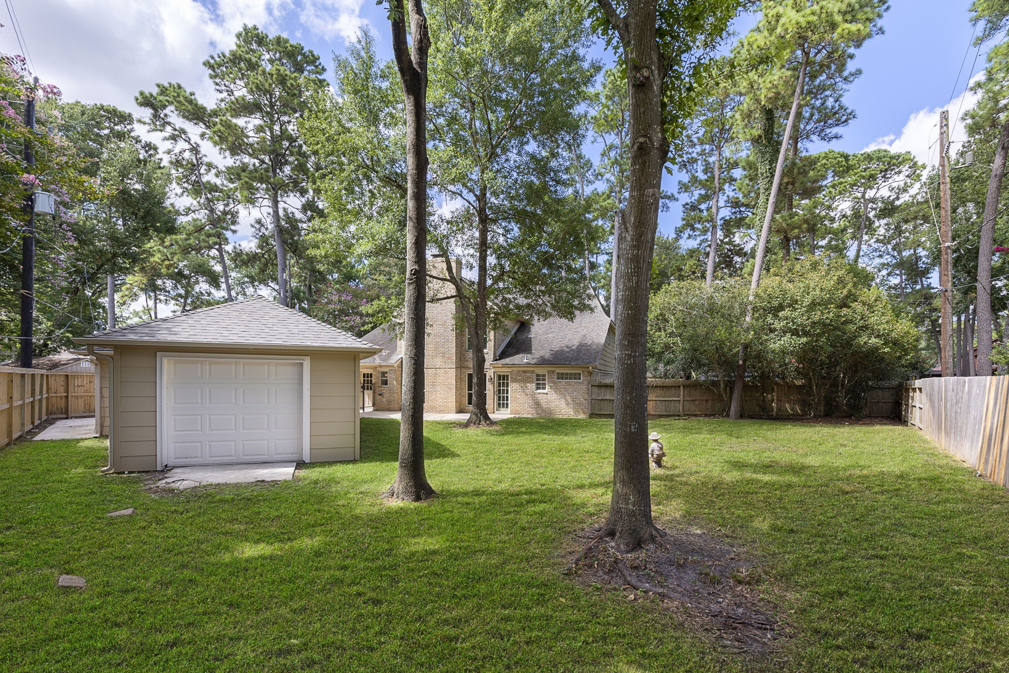 17706 Asphodel Lane Spring, TX 77379 - Photo 42 of 48 a view of a house with backyard and a tree