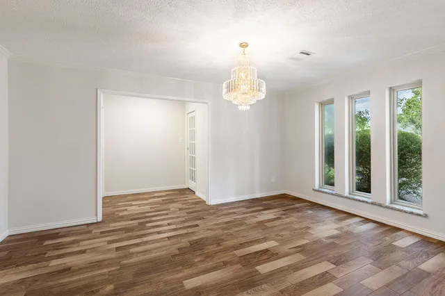 a view of a bedroom with a window