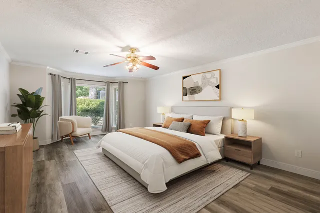 a spacious bathroom with a double vanity sink mirror and next to a window