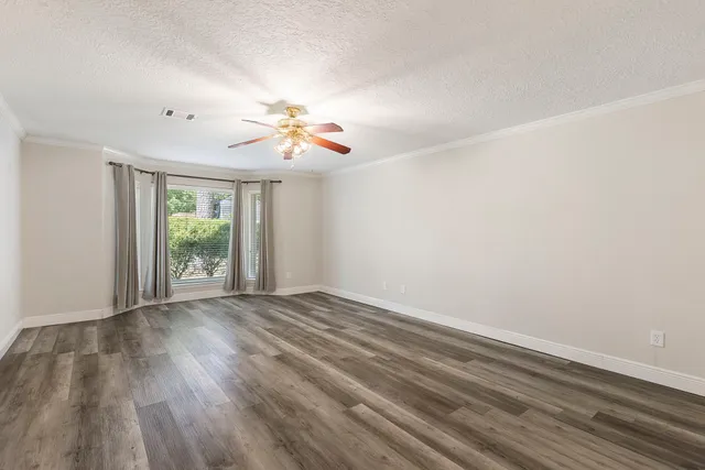 a white bath tub sitting next to a window