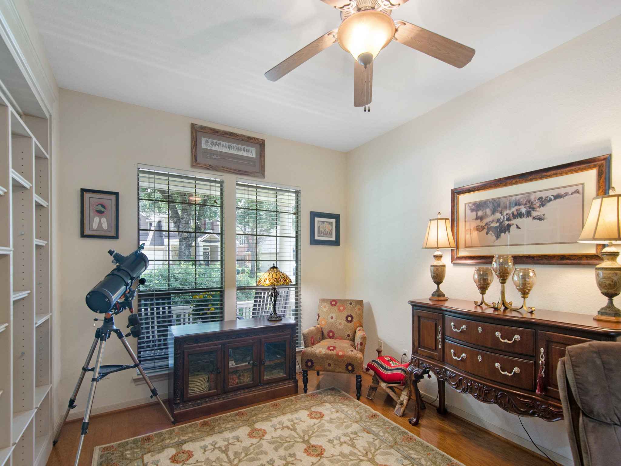 28323 Ryans Ridge Lane Spring, TX 77386 - Photo 11 of 45 Warm wood flooring and front-facing windows overlooking the cozy front porch create a comfortable and inspiring workspace.