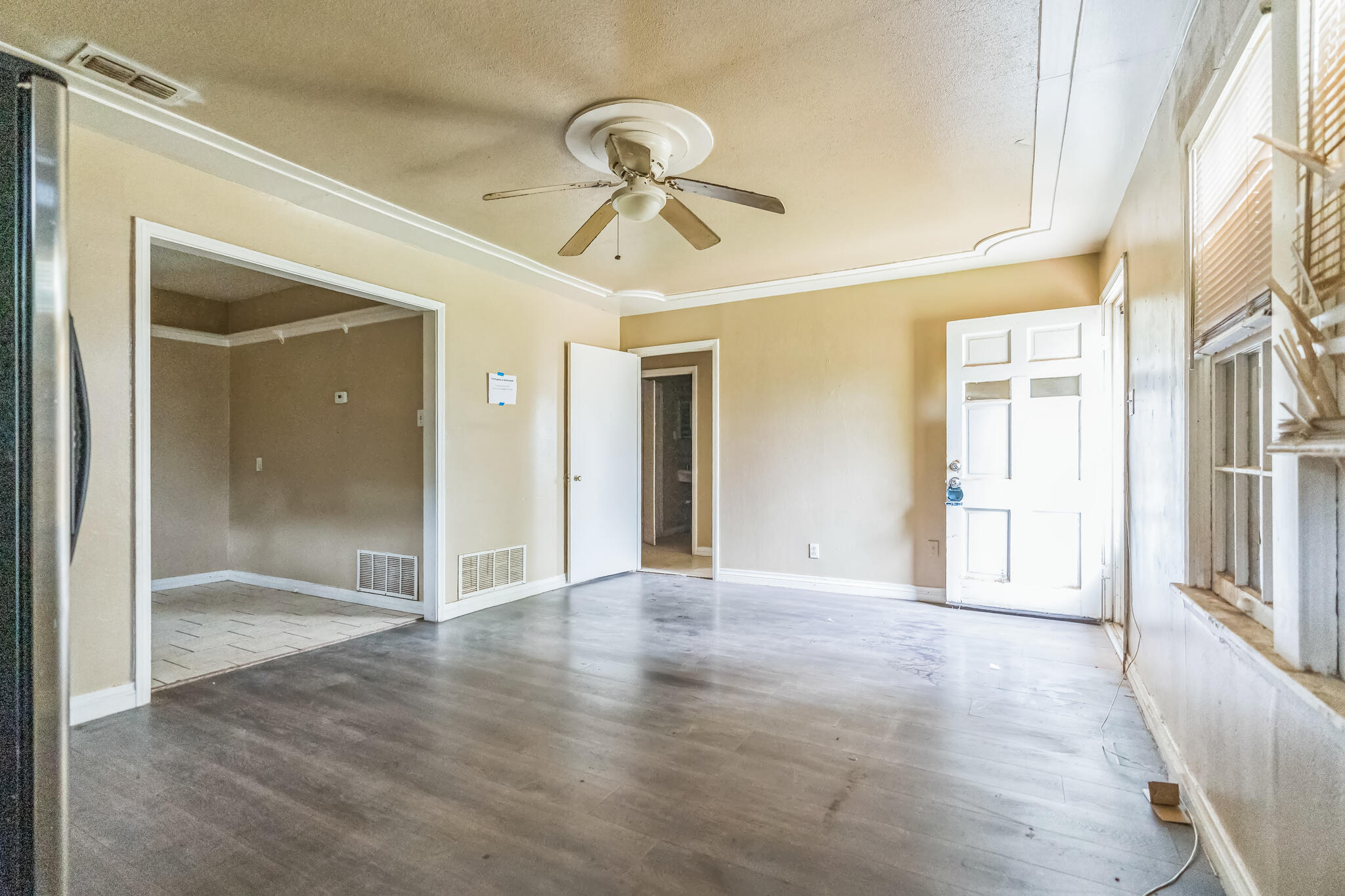 1510 33rd Street Lubbock, TX 79411 - Photo 27 of 33 wooden floor in an empty room with a window